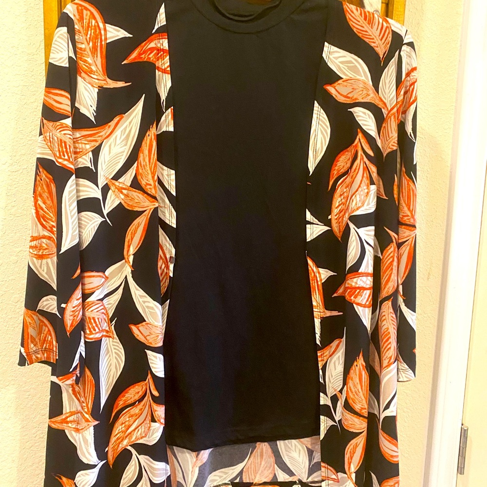 Beautiful 3/4 Length Jacket, Multicolored that goes with many options.  Size M.